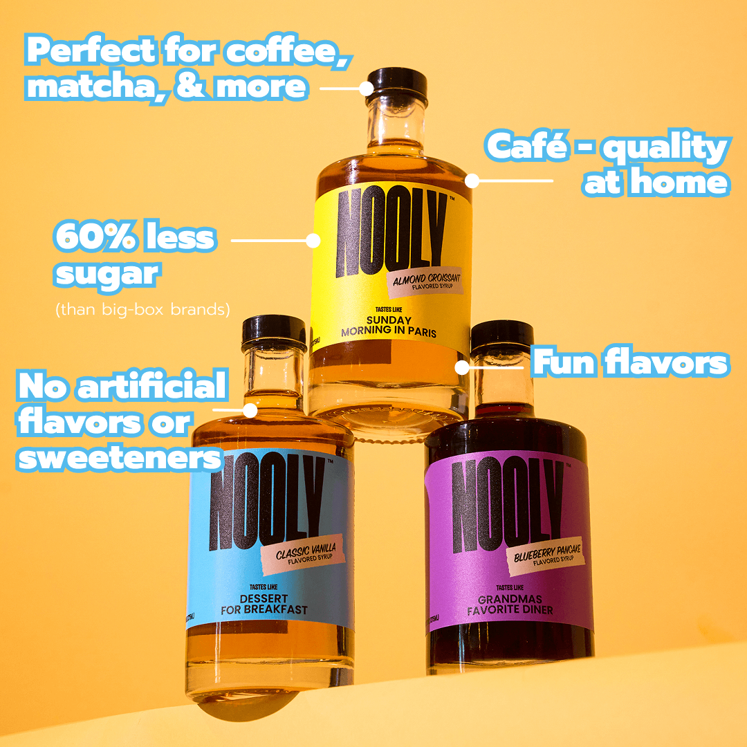 Bottle of Nooly almond syrup stacked on two other bottles of Nooly coffee syrup with text highlighting benefits on an orange background