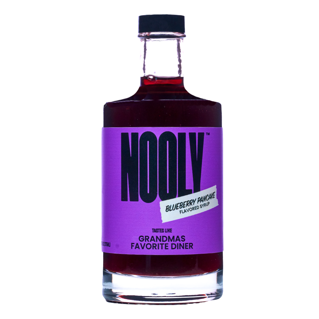 Bottle of Nooly blueberry coffee syrup with a purple label