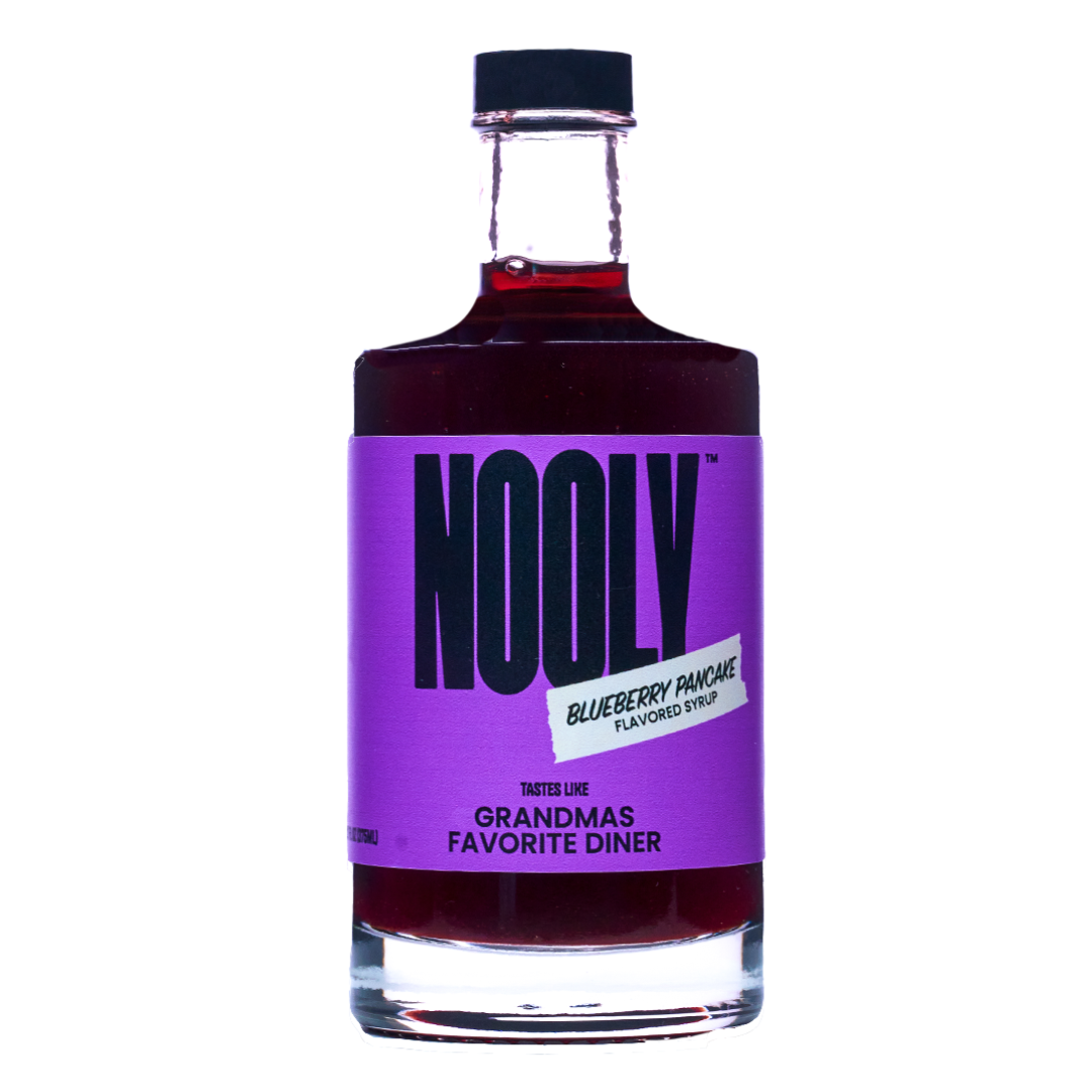 Bottle of Nooly blueberry coffee syrup with a purple label on a white background