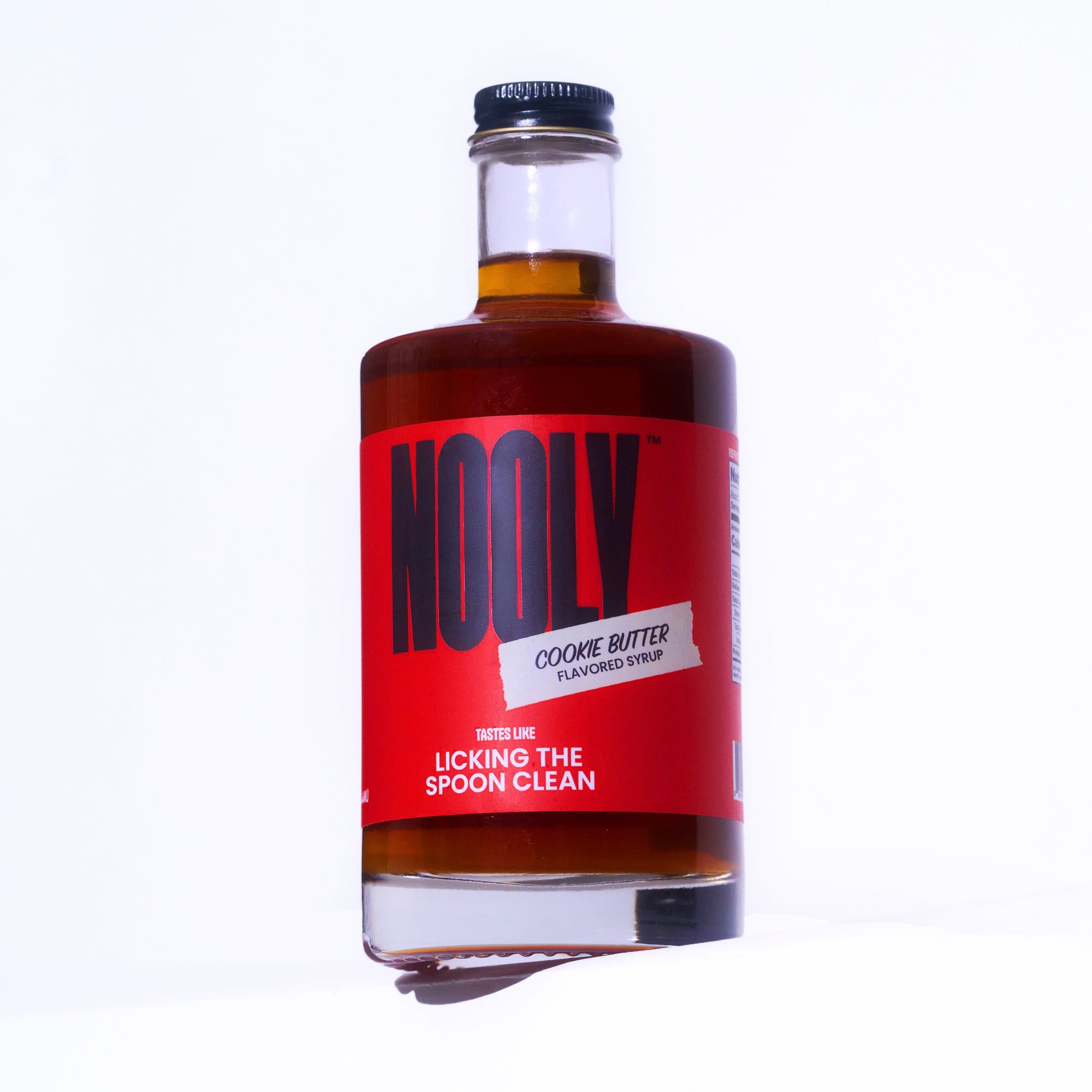 Bottle of Cookie Butter Coffee Syrup on a white background